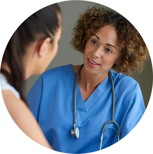 A doctor talking with a specialty pharmacy patient
